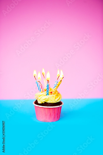  Birthday cake. Happy birthay. Festive cake with cream and sprinkled with small hearts. The sweetness on birthday. Valentine's day cake.