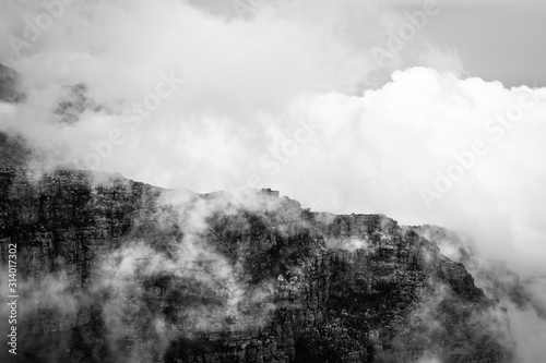 Clouds rolling over Table Mountain in Cape Town, Southafica. This fenomenon is called Tablecloth.