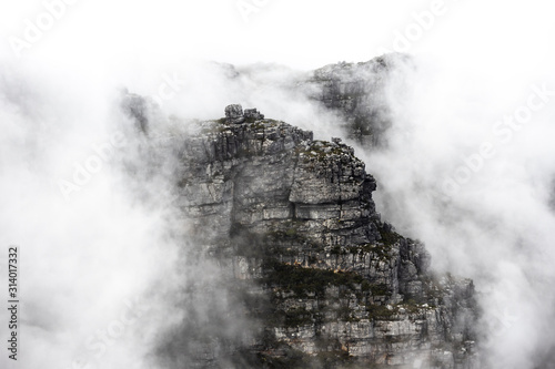 Clouds rolling over Table Mountain in Cape Town, Southafica. This fenomenon is called Tablecloth.