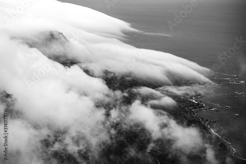 Clouds rolling over Table Mountain in Cape Town, Southafica. This fenomenon is called Tablecloth.