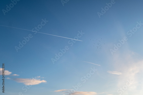 Bright blue sky with white clouds. Great background with copyspace
