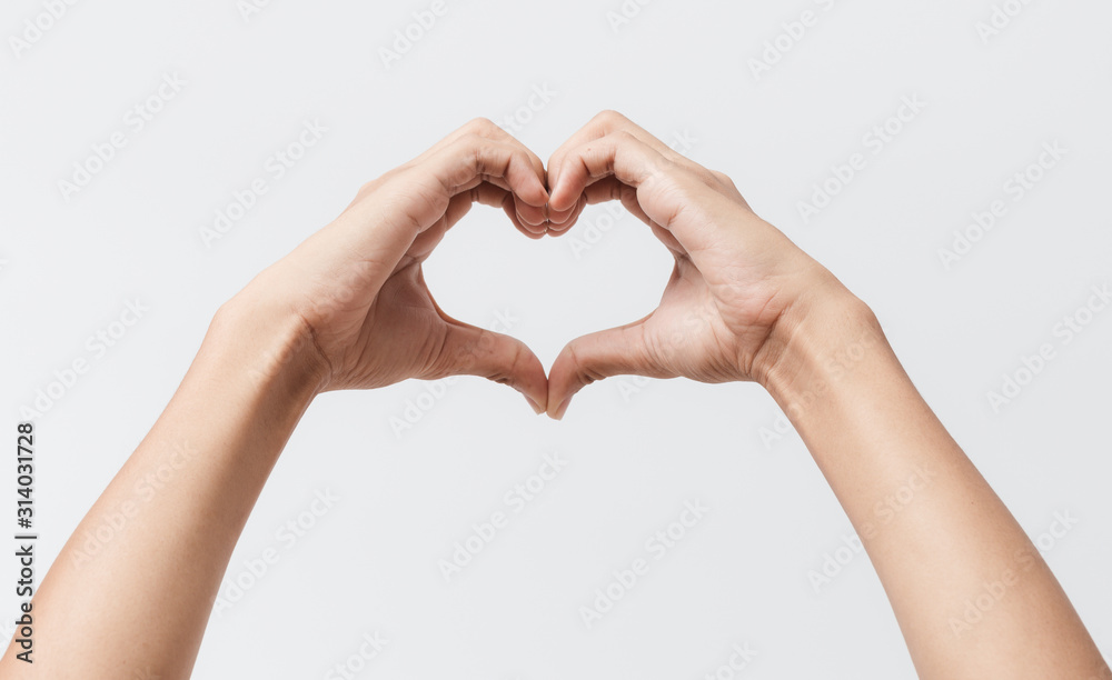 Man hands making a heart shape on a white isolated background Man hands making a heart shape on a white isolated background