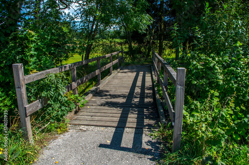 A timber bridge or wooden bridge is a bridge that uses timber or wood as its principal structural material.