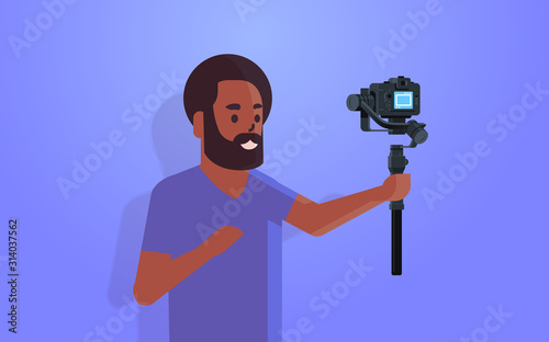 man blogger holding stabilizer with camera live streaming broadcast social media networking concept african american streamer recording video taking selfie photo portrait horizontal vector