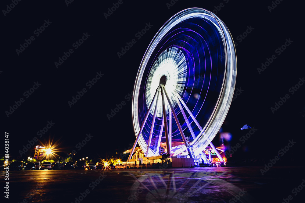 Ferris wheel in a public amusement park located in Bangkok, Thailand.