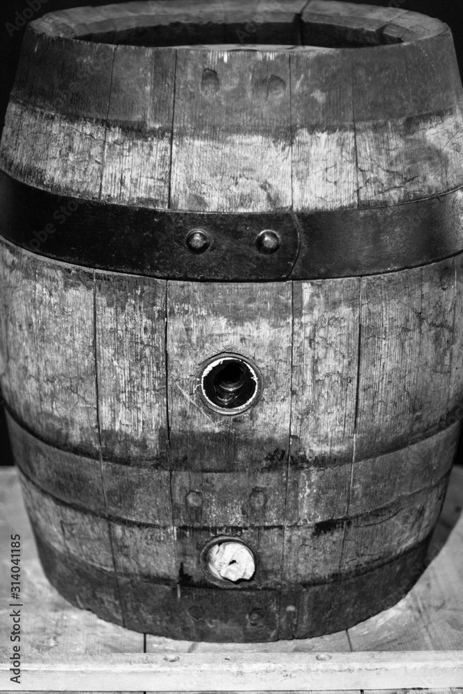 Fototapeta premium black and white image of old wine barrel