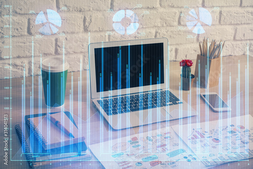 Double exposure of forex graph and work space with computer. Concept of international online trading.