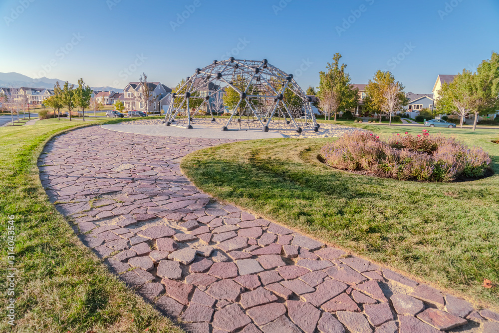 Curved path with crazy paving in a park