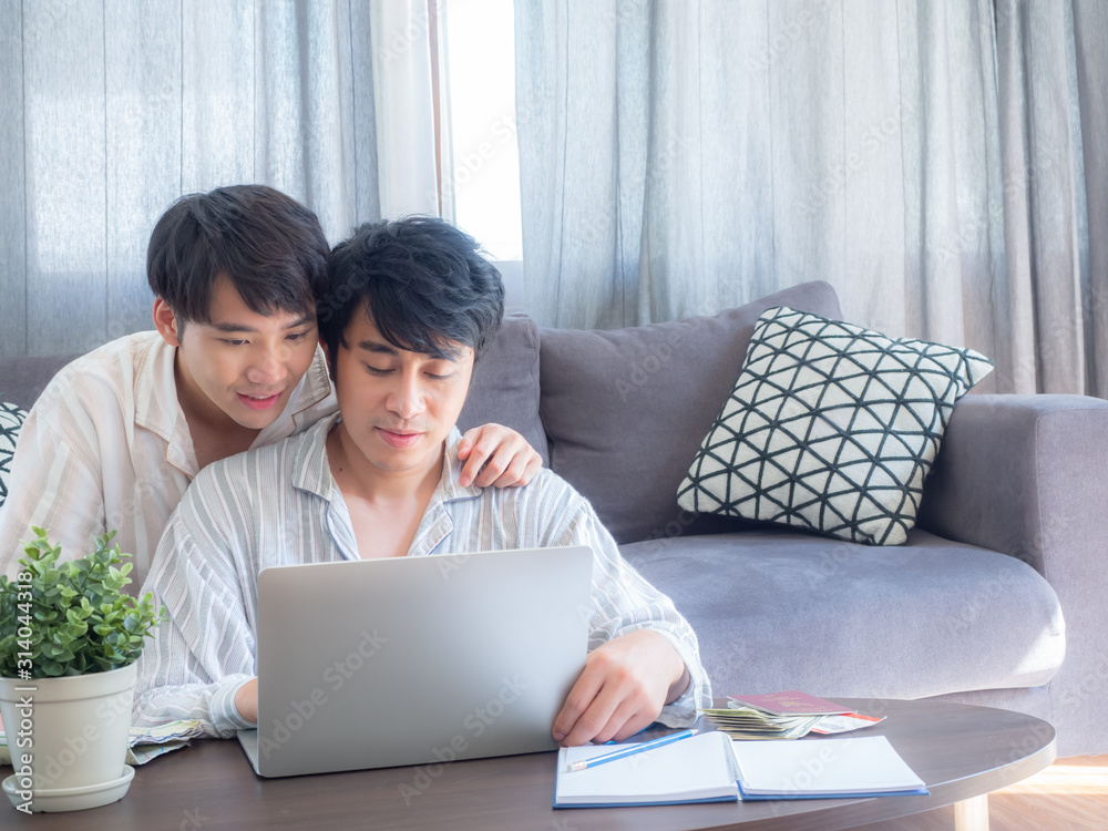 asia couple gay doing activities at home concept.guys play game, cooking, pillow fight, lying in house asia couple gay doing activities at home concept.guys play game, cooking, pillow fight, lying in house