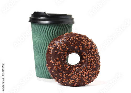 Cup of coffee with tasty donut on white background