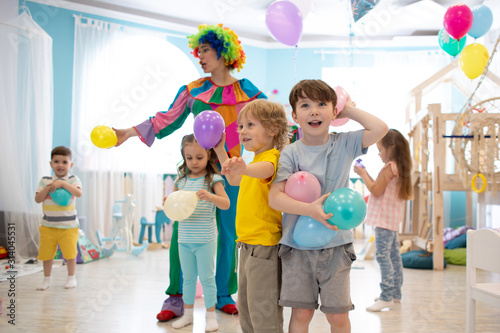 Clown entertains kids at ch...