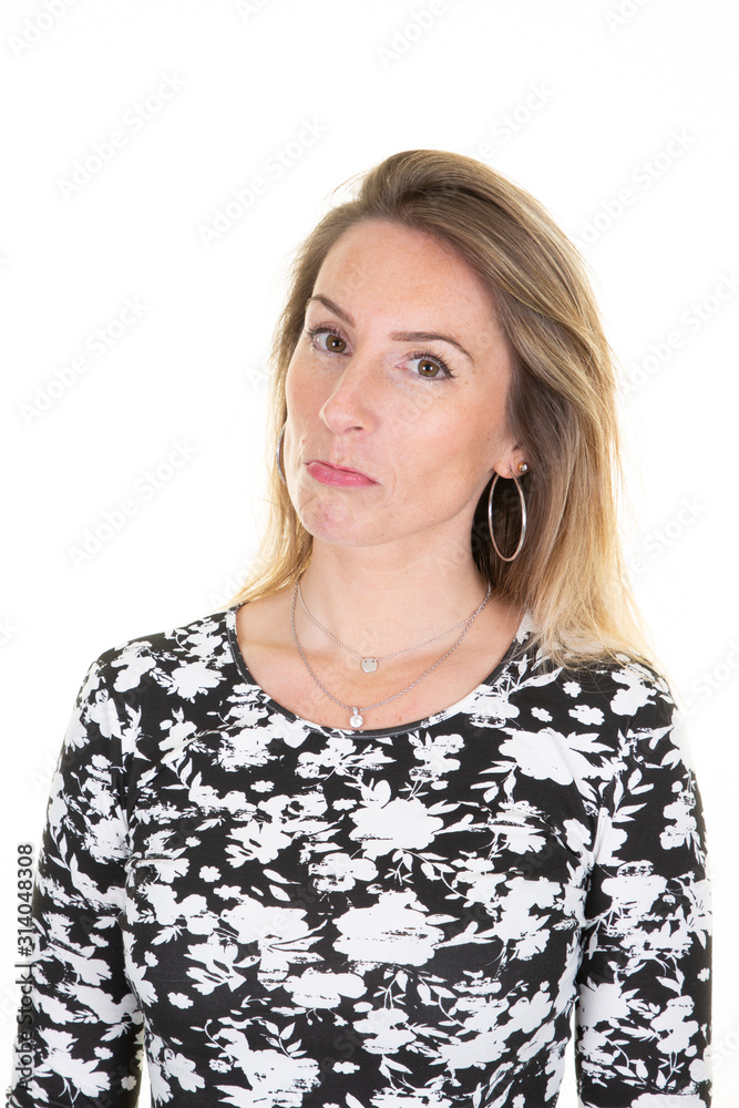 Young pretty sad woman portrait frowning face in displeasure Young pretty sad woman portrait frowning face in displeasure