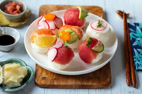 Temari sushi balls with salmon, tuna and vegetables