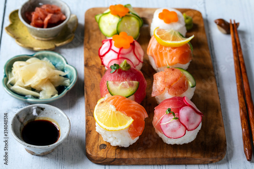 Tableau sur toile Temari sushi balls with salmon, tuna and vegetables
