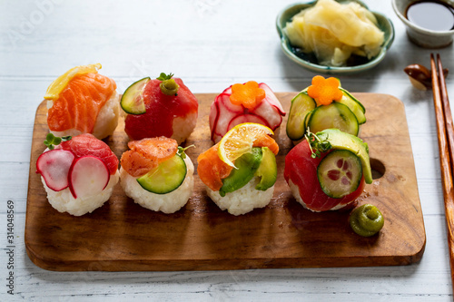 Temari sushi balls with salmon, tuna and vegetables photo