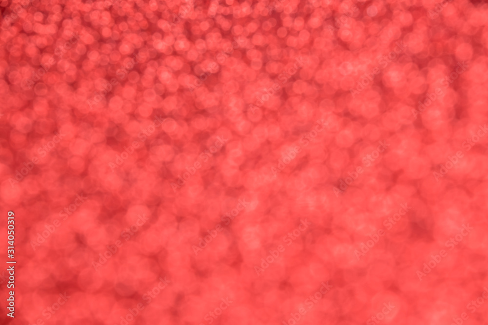 Beautiful festive red background with blurred sequins Beautiful festive red background with blurred sequins
