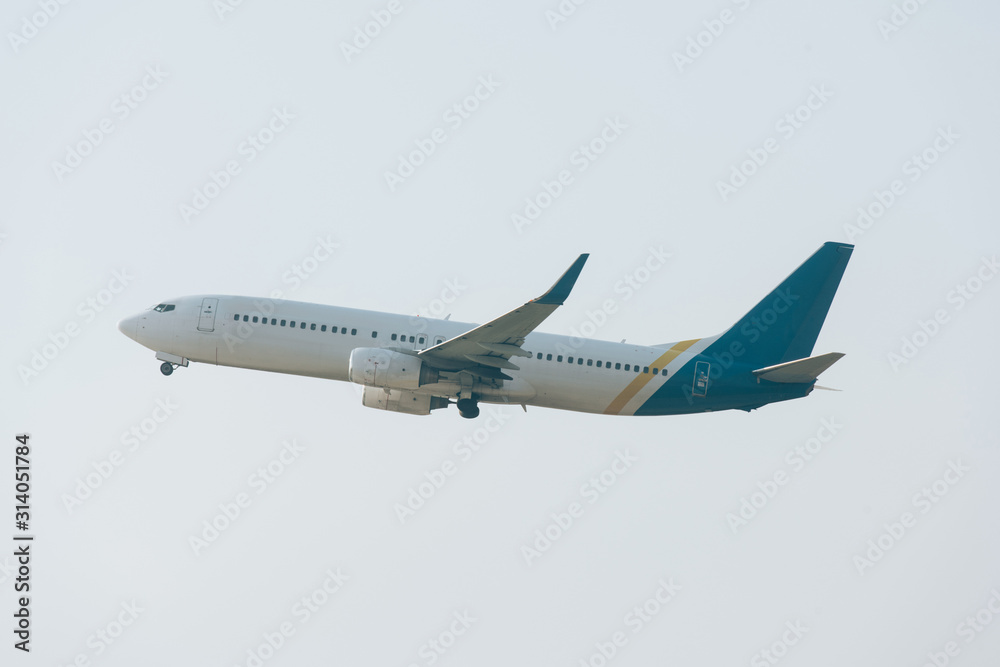 Low angle view of aeroplane with cloudy sky at background