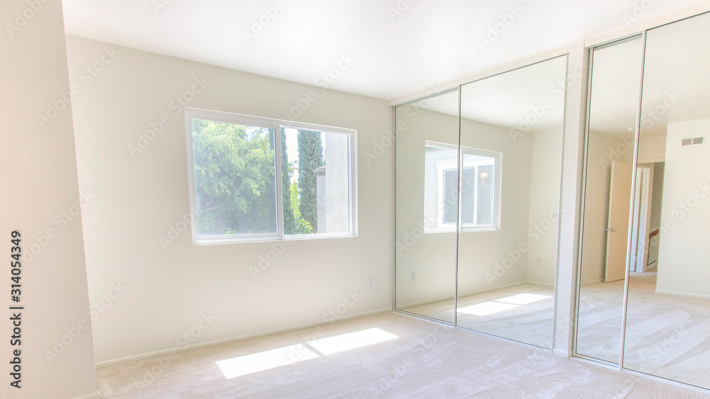 Fototapeta premium Panorama frame Master bedroom with double closet doors