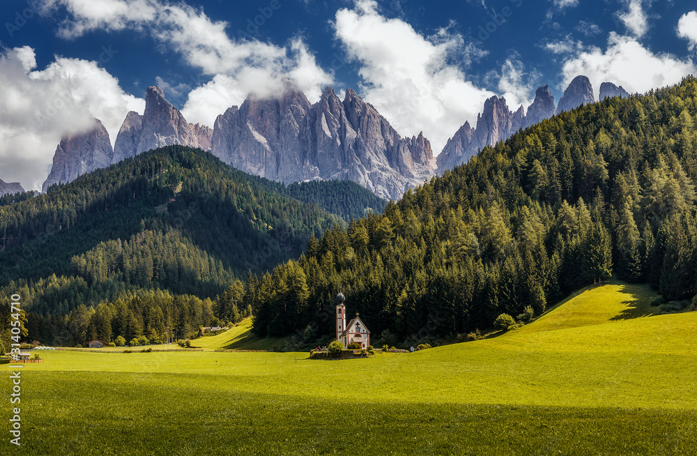 Awesome alpine Landscape. Famous best alpine place of the world, Santa Maddalena (St Magdalena) village with magical Dolomites mountains in background, Val di Funes valley, Trentino Alto Adige. Italy