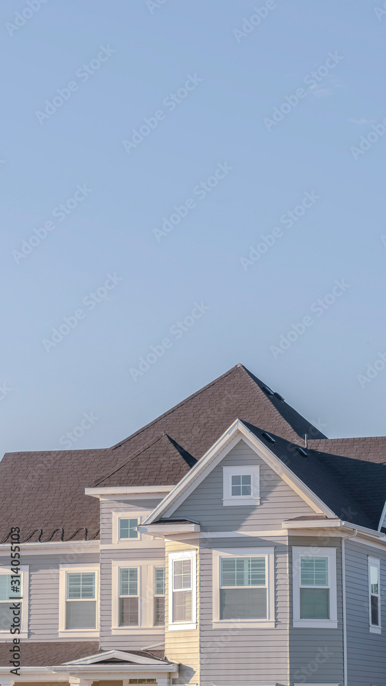 Vertical frame Modern upper floor of a grey timber house Vertical frame Modern upper floor of a grey timber house