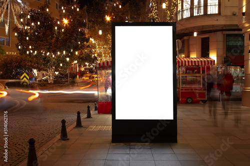 Blank billboard on night street