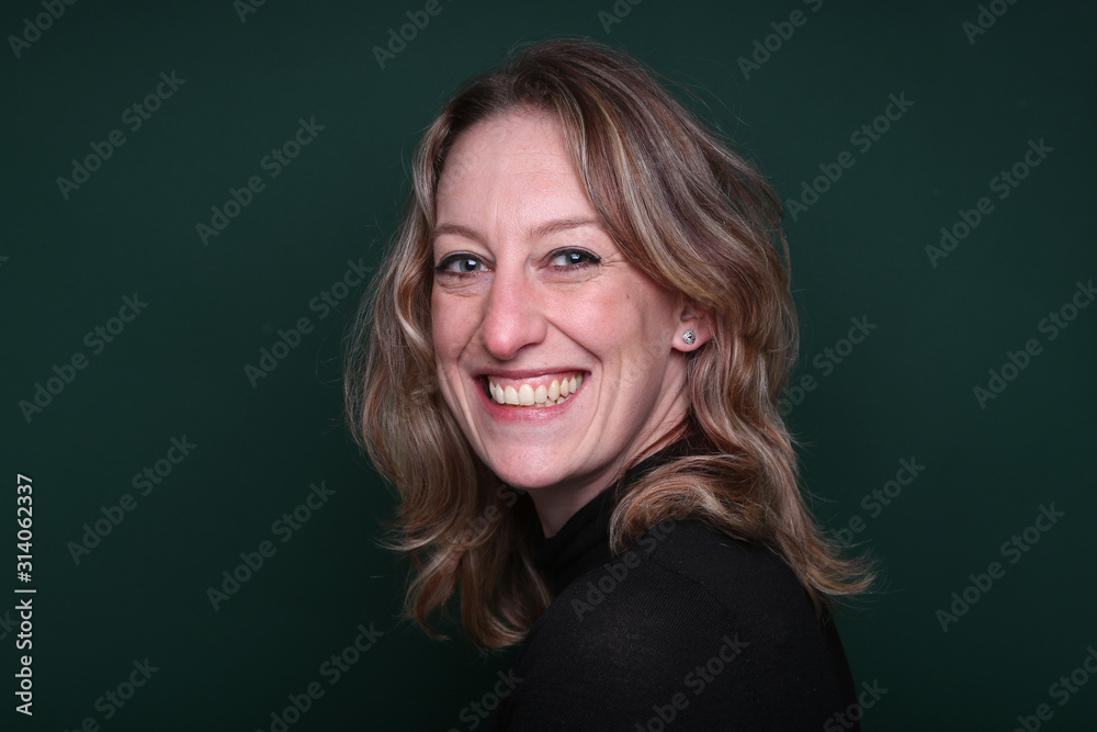 Fototapeta premium Beautiful woman in front of a background