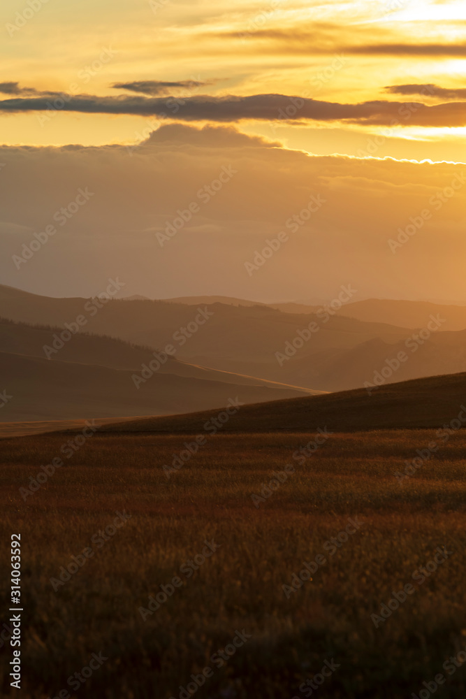 Epic sunset over Mongolian mountains in southern Mongolia. Epic sunset over Mongolian mountains in southern Mongolia.