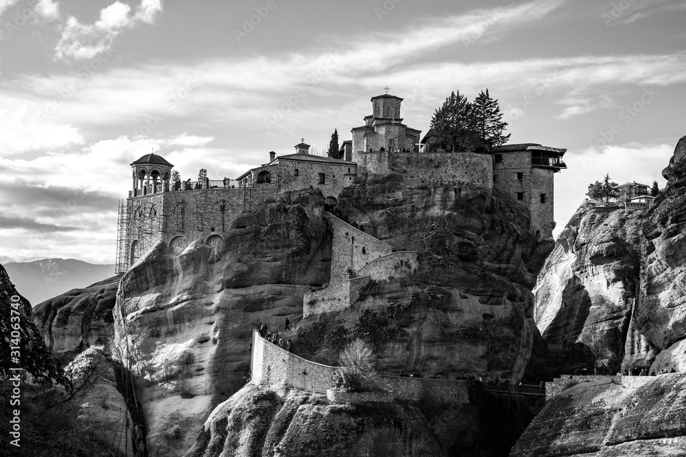 Black and white photo of the Holy Monastery of Varlaam. The Monasteries of Meteora an UNESCO World Heritage in Kalambaka (Kalabaka), Greece.