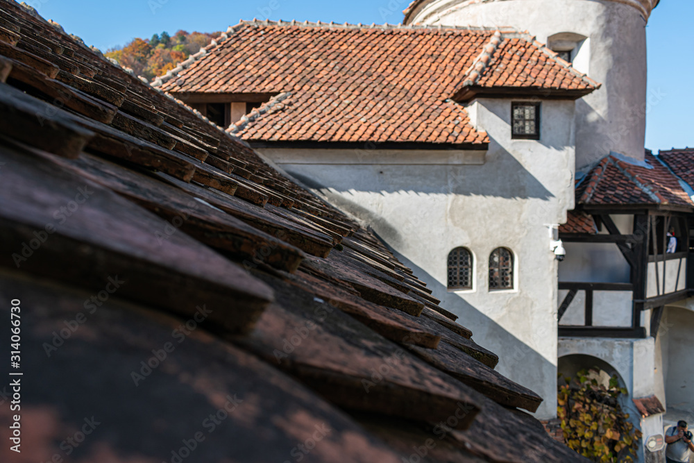 Naklejka premium the top of the Bran castle seen from an old window. beautiful view.