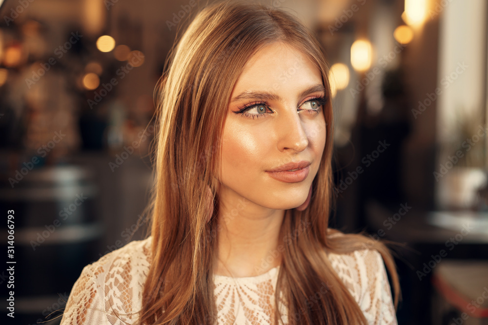 Beautiful female model portrait in a cafe Beautiful female model portrait in a cafe