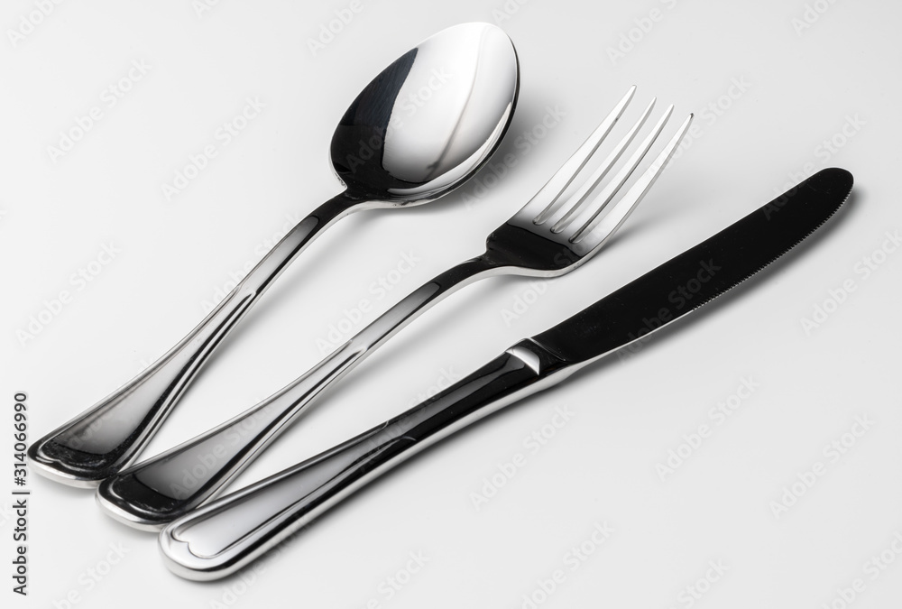 Spoon, fork and knife on a white background Spoon, fork and knife on a white background