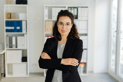 Confident young business manageress photo