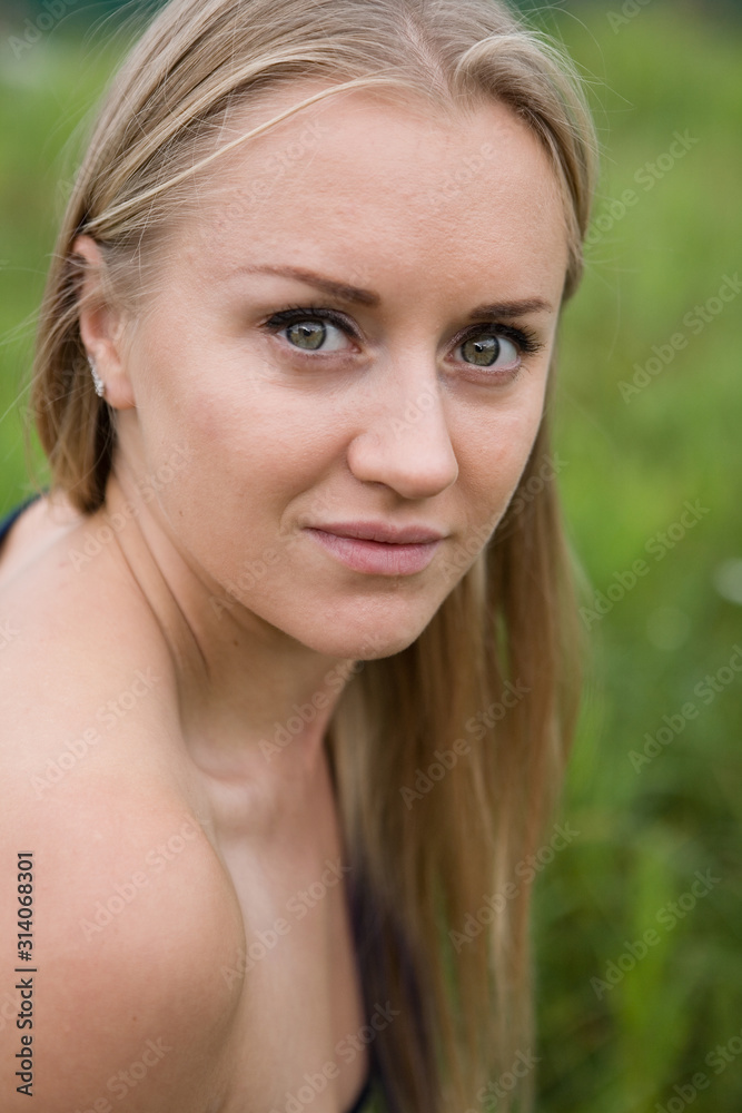 The face of a young natural blonde close-up. The face of a young natural blonde close-up.