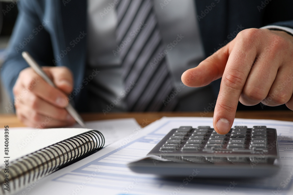 Man in presentable suit in office Man in presentable suit in office