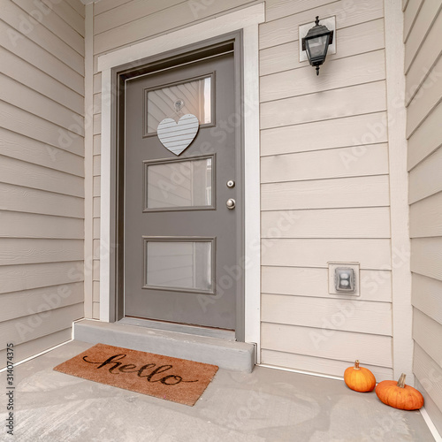 Square frame Clean white entrance to an urban houses photo