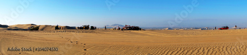 Desert and people in Huacachina Peru