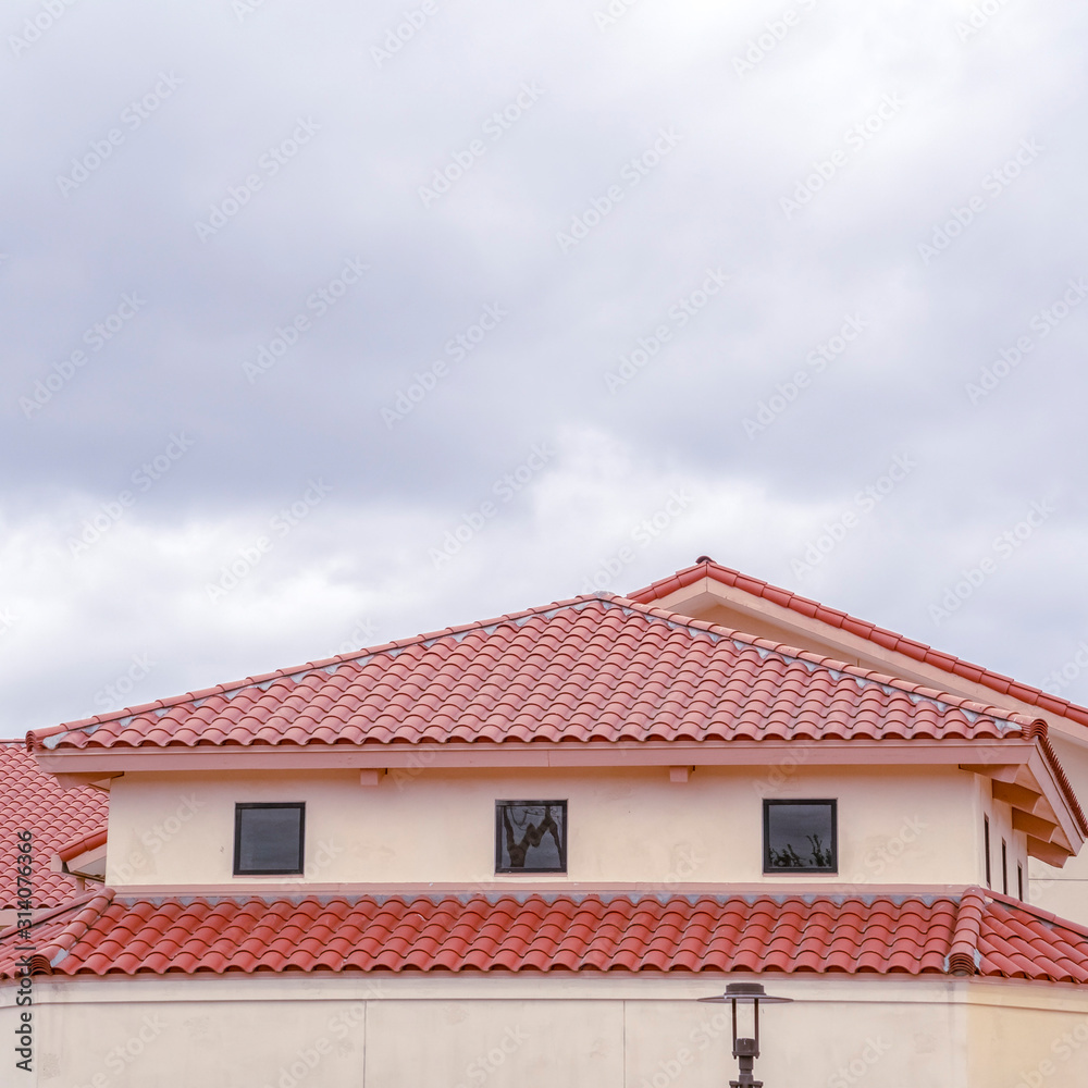 Square frame Tiled roof on a building with ventilation windows