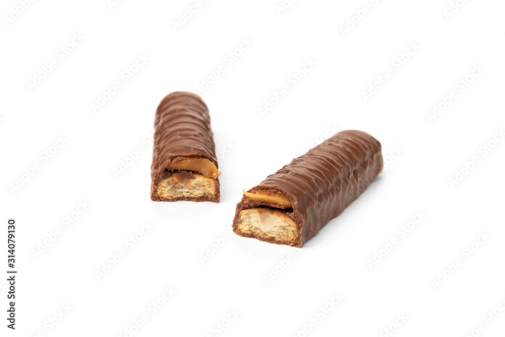 Shortbread stick with caramel in chocolate isolated on white background. Shortbread stick with caramel in chocolate isolated on white background.