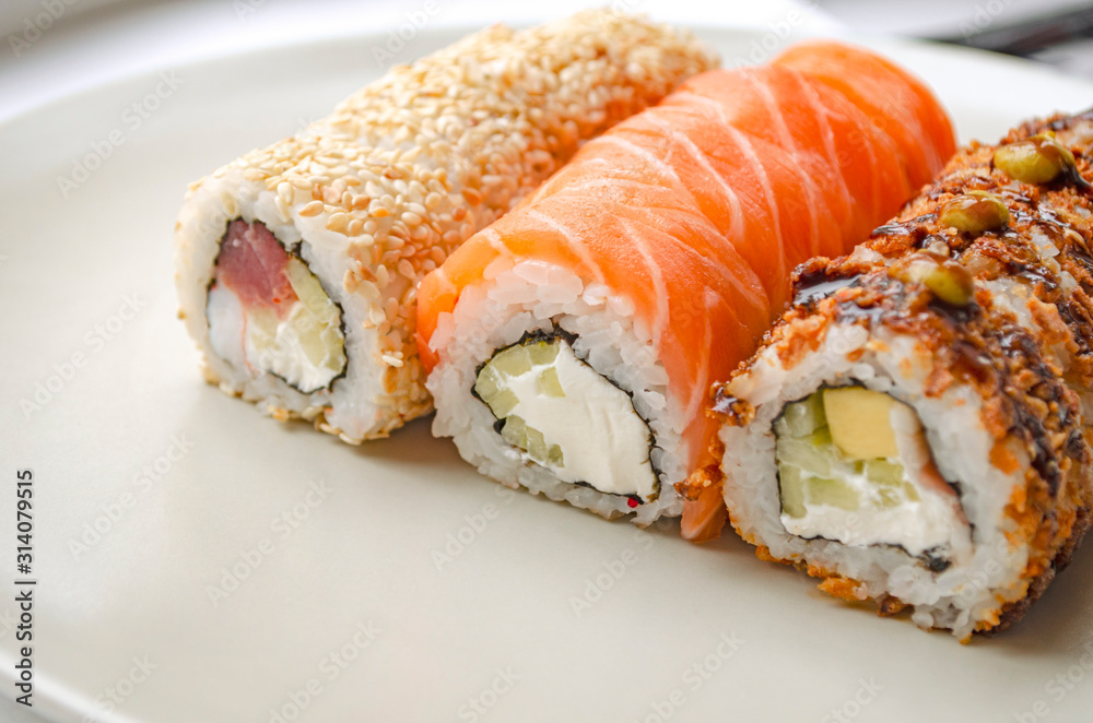 Japanese cuisine. Rolls on a plate. Philadelphia. Japanese cuisine. Rolls on a plate. Philadelphia.