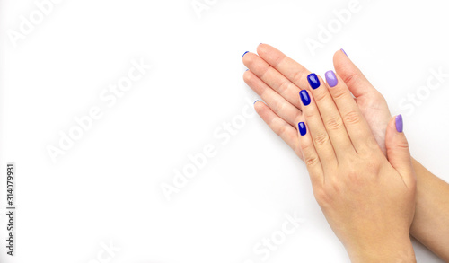 Stylish trendy women s manicure. Blue and lilac