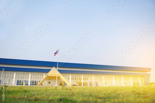 Public Building high school with Exterior view and playground.