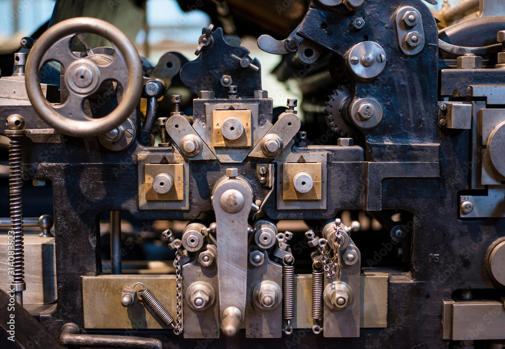 Close-up view of an old printing machine