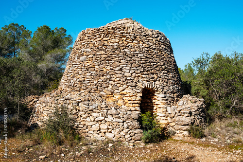 dry stone shelter in Catalonia, Spain photo