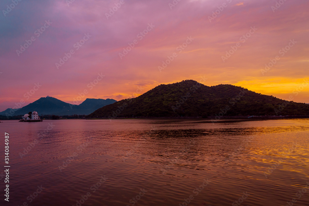 View of the Fateh Sagar Lake during evening in Udaipur, Rajasthan, India View of the Fateh Sagar Lake during evening in Udaipur, Rajasthan, India