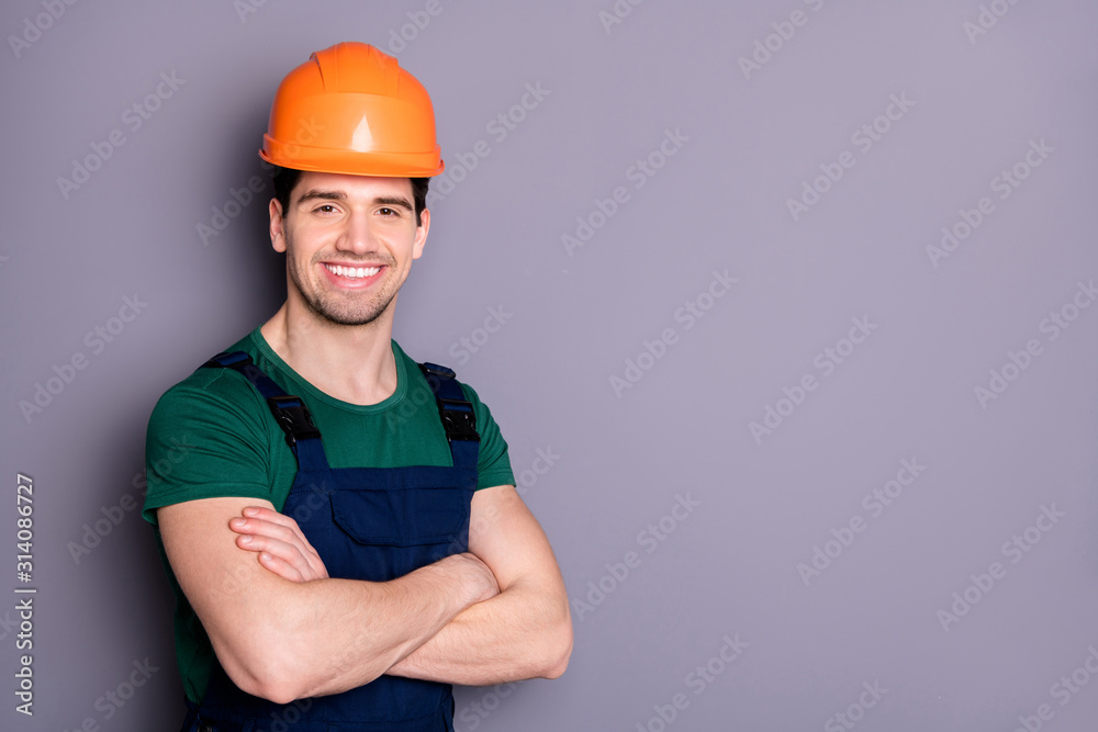 Close-up portrait of his he nice attractive cheerful cheery content guy repairer craftsman folded arms isolated over gray violet purple pastel color background Close-up portrait of his he nice attractive cheerful cheery content guy repairer craftsman folded arms isolated over gray violet purple pastel color background