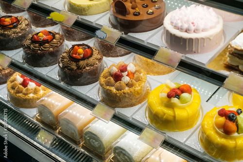 Photography sweets and cakes on display in bakery shop -