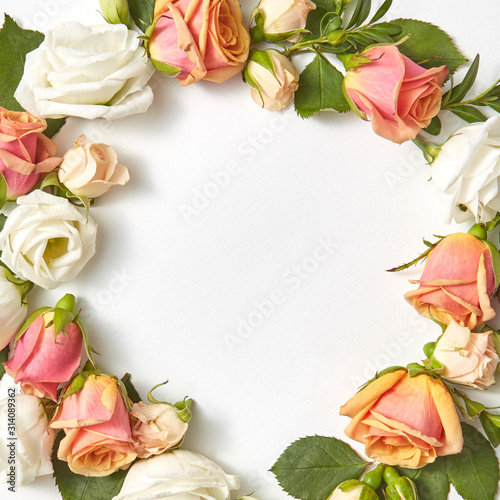 Round roses flowers frame for congratulation.