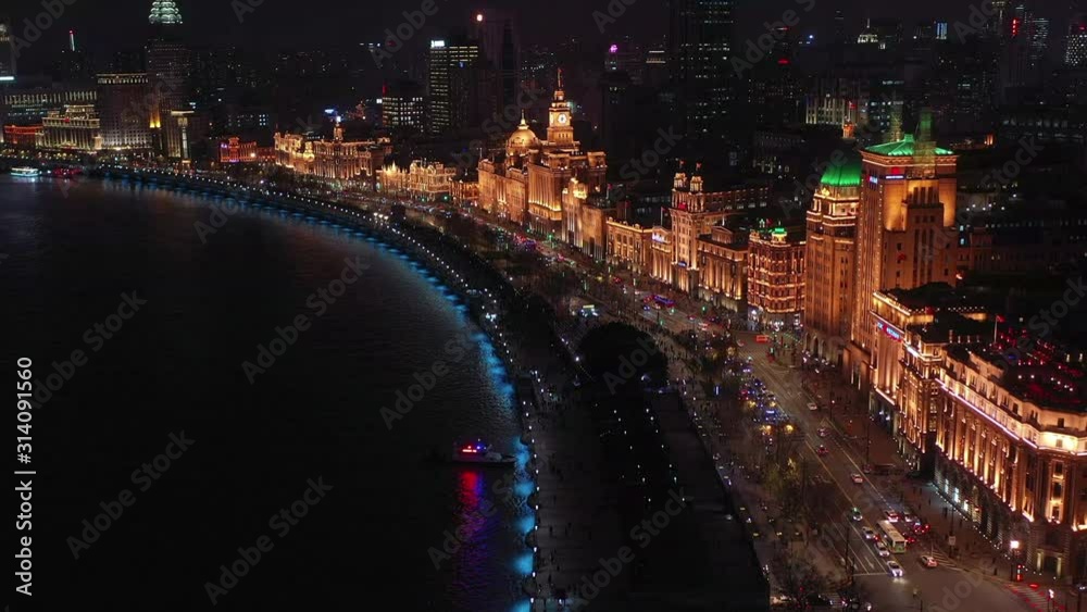 Aerial view Shanghai at night The Bund, The Bund in Shanghai is a famous waterfront area in central Shanghai at night, China. Aerial view Shanghai at night The Bund, The Bund in Shanghai is a famous waterfront area in central Shanghai at night, China.
