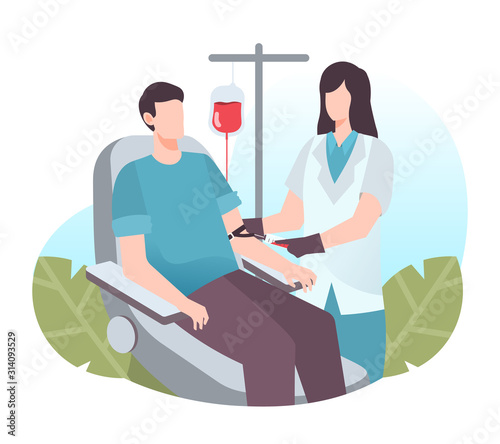 Man sitting in medical chair donating his blood. Blood donation concept