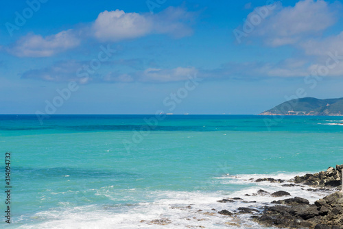 Beautiful cerulean sea and the rocky beach  Tyrrhenian sea in Tuscany  Italy